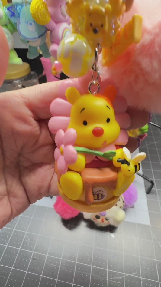 POOH WITH FLOWER BAG CHARM